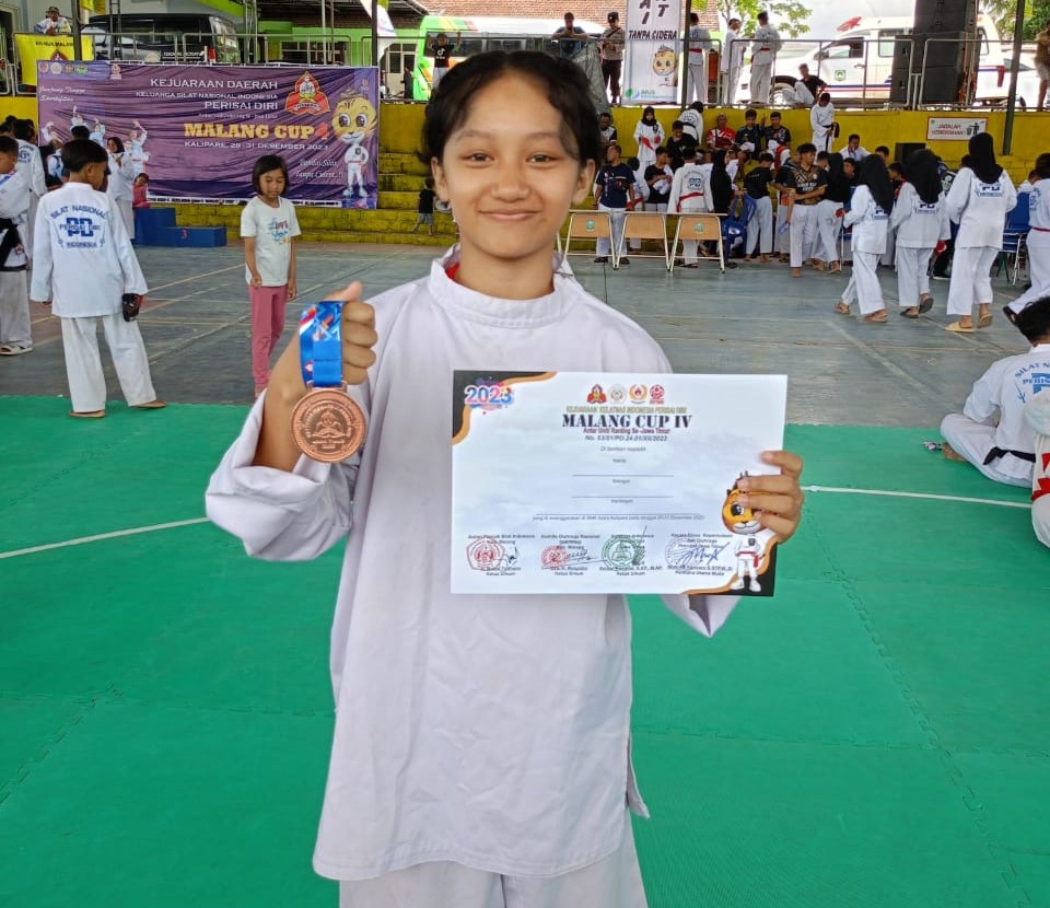 Juara 3 Tanding Kelas C Pra Remaja: Prestasi Tania Indira Ismawardani dari SMK Negeri 6 Malang